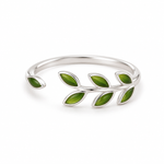 Open sterling silver ring with green epoxy leaves along a slender branch-shaped band